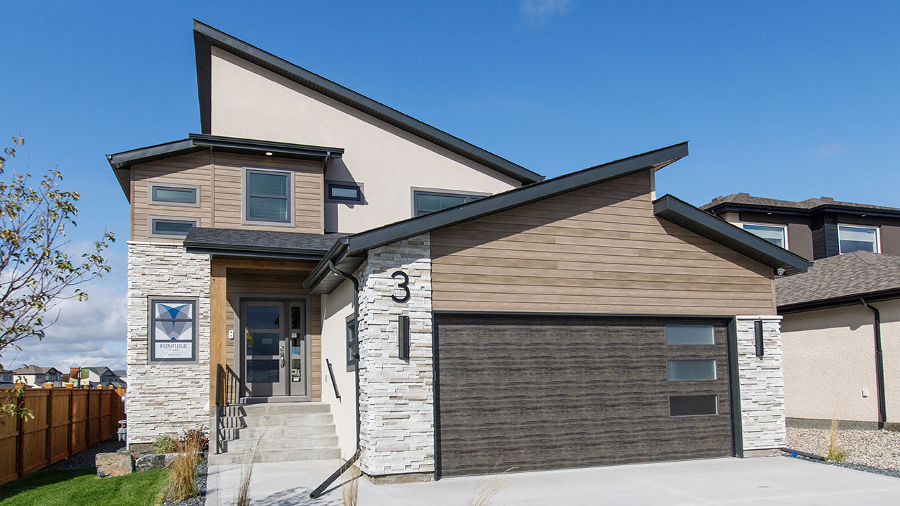 Exterior of a single family home by Foxridge in Winnipeg.