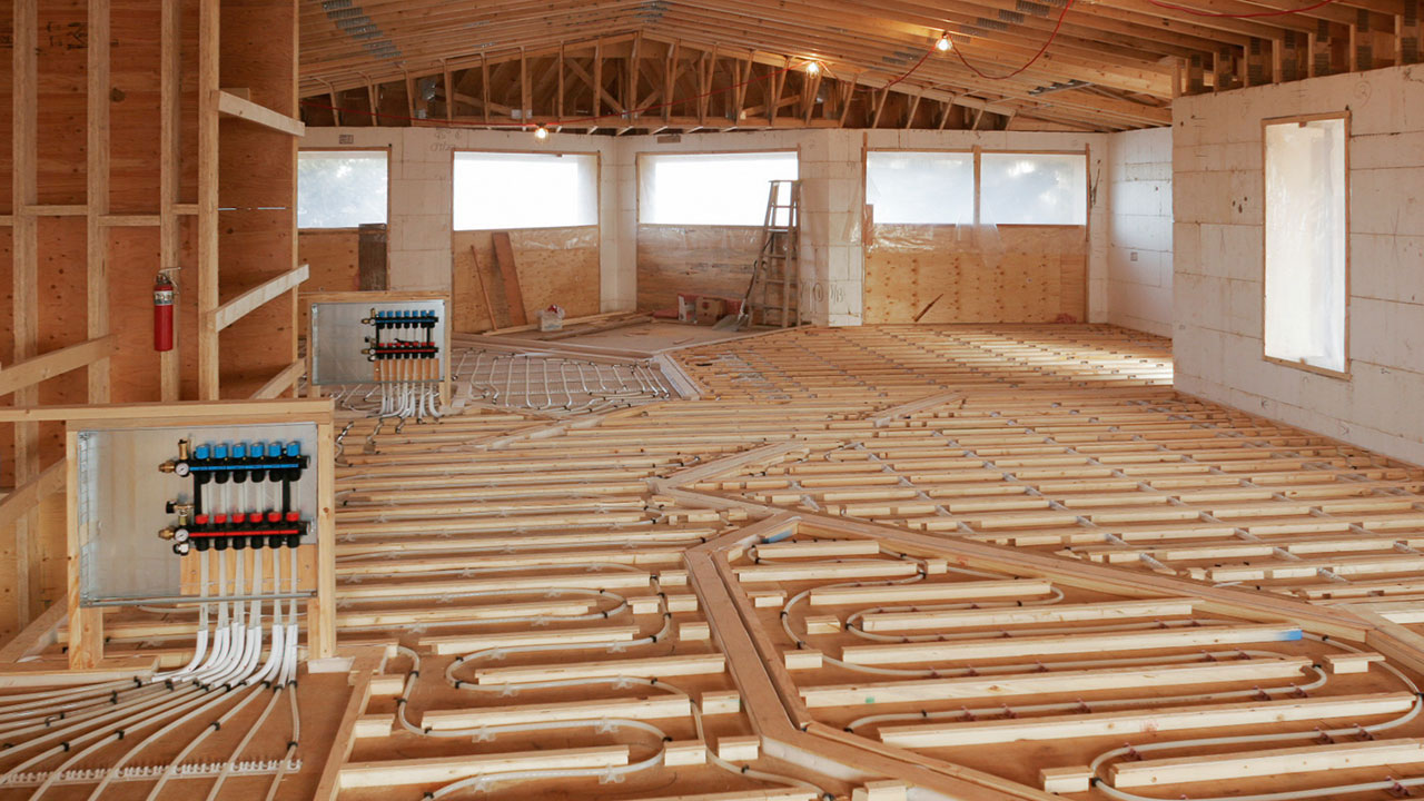 Installation of radiant heating completed by WM Schmidt.