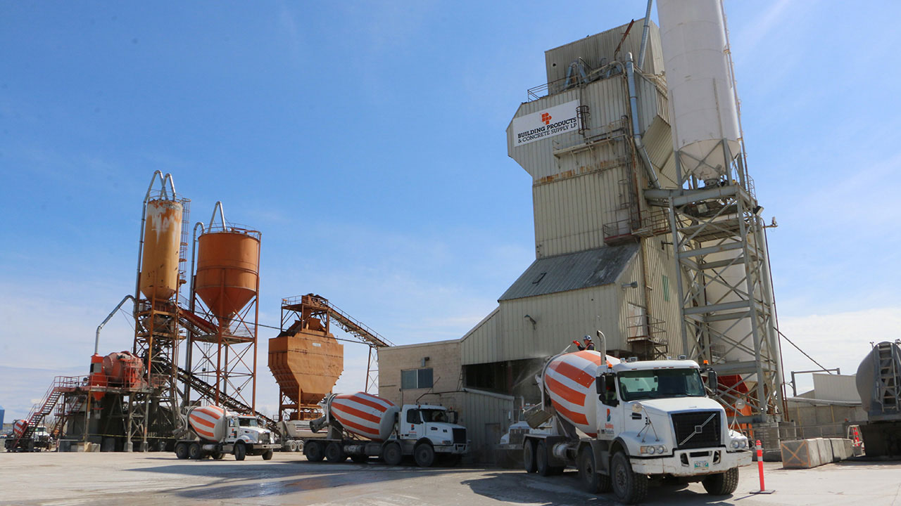 Building Product trucks being filled at ready mix facility