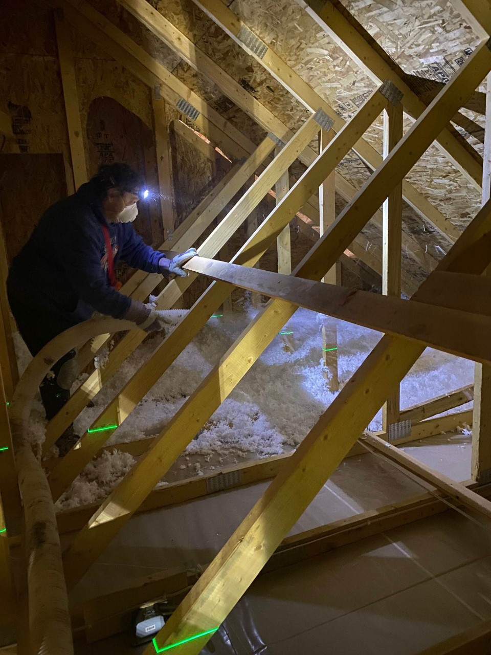 Empire Drywall Blowing in wool Attic Insulation in Edmonton