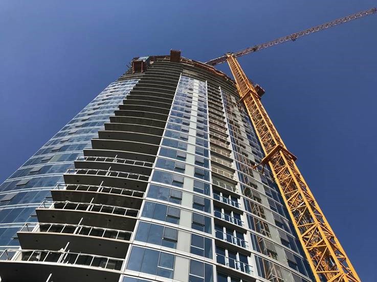 looking straight up at the shoreline building under construction